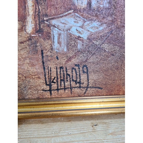 444 - A framed oil on canvas of an Eastern European scene signed lower right - approx. 75cm wide x 55cm hi... 