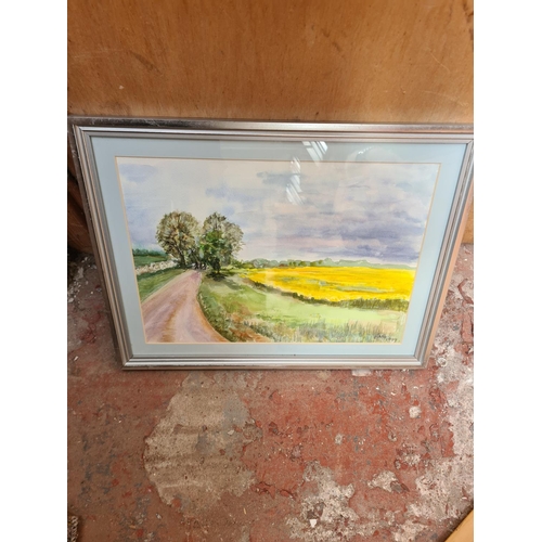 445 - A large collection of framed watercolours and oil paintings