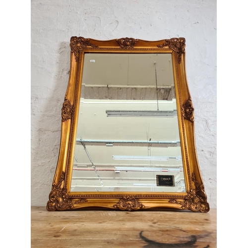 447 - Three items, two 19th century style gilt framed bevelled edge wall mirrors and one gilt framed paste... 