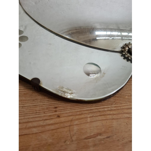 476A - A mid 20th century floral shaped convex wall hanging mirror - approx. 56cm in diameter