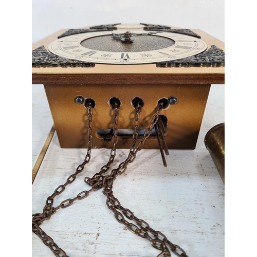 197 - An E. Schmeckeneecher of West Germany brass Tempus Fugit clock face with pendulum and two weights - ... 