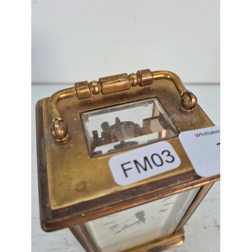 201 - A St. James brass and bevelled glass cased key wind carriage clock - approx. 13cm high x 8cm wide x ... 