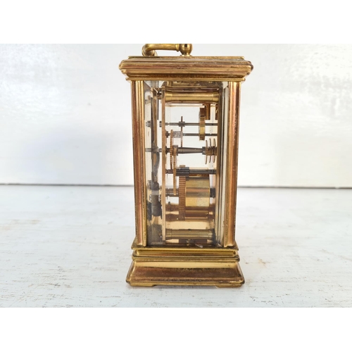 201 - A St. James brass and bevelled glass cased key wind carriage clock - approx. 13cm high x 8cm wide x ... 