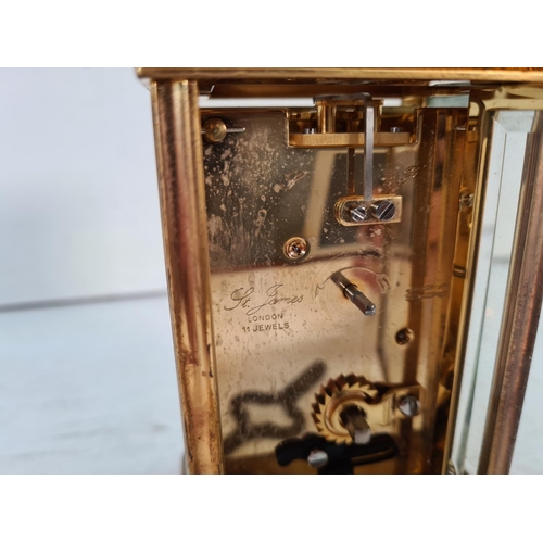 201 - A St. James brass and bevelled glass cased key wind carriage clock - approx. 13cm high x 8cm wide x ... 