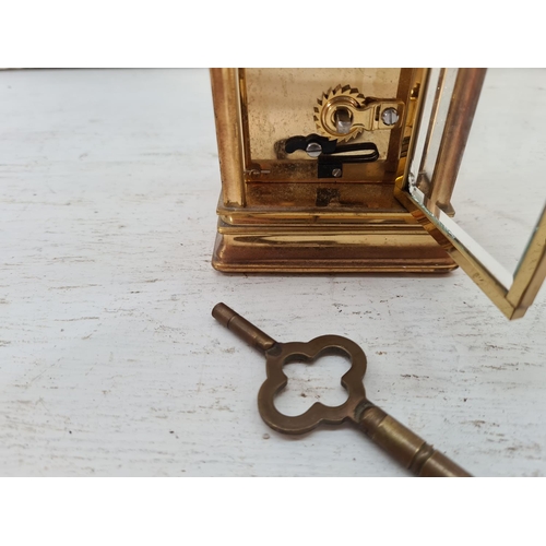 201 - A St. James brass and bevelled glass cased key wind carriage clock - approx. 13cm high x 8cm wide x ... 