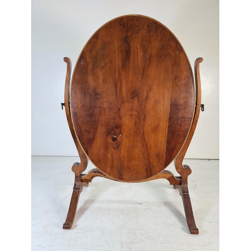 214 - A burr walnut oval swinging bathroom mirror - approx. 58cm high x 39cm wide