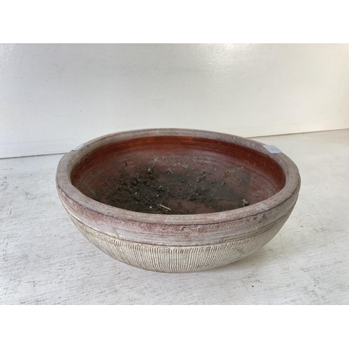 225 - A mid 20th century terracotta circular bowl - approx. 13cm high x 35cm in diameter