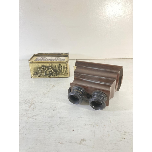 229 - A 19th century rosewood Brewster type stereoscope with a large quantity of slides including six glas... 