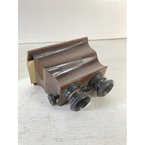 229 - A 19th century rosewood Brewster type stereoscope with a large quantity of slides including six glas... 