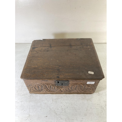 233 - A 17th century carved oak Bible box - approx. 17cm high x 42cm wide x 33cm deep