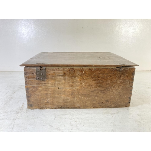 233 - A 17th century carved oak Bible box - approx. 17cm high x 42cm wide x 33cm deep