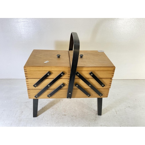 255 - A mid 20th century beech concertina sewing box - approx. 46cm high x 42cm wide x 21cm deep