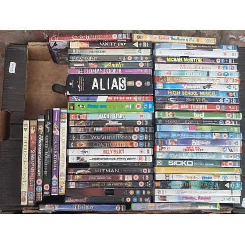 594 - Two boxes containing a collection of DVDs - see images for titles