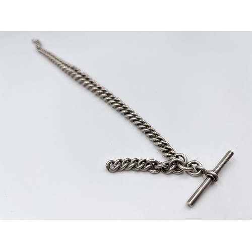 An antique hallmarked sterling silver 34cm Albert chain with maker's ...