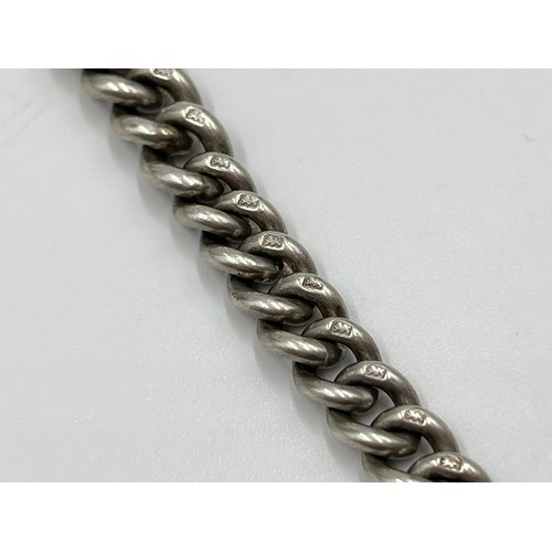 1156C - An antique hallmarked sterling silver 34cm Albert chain with maker's mark 'G.E.C' - approx. gross we... 