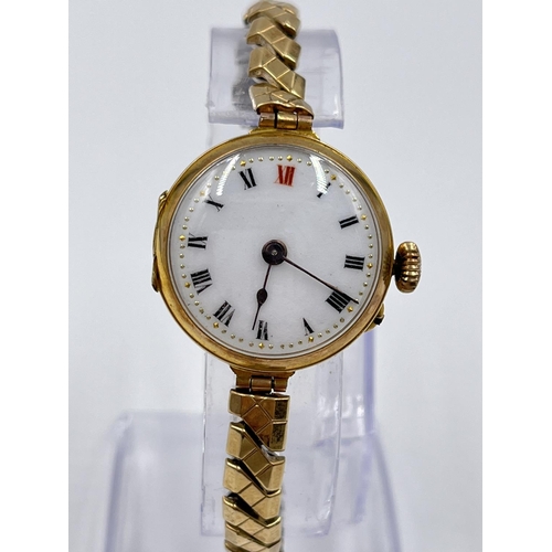 1157 - An early 20th century George Stockwell 9ct gold cased women's trench watch with Swiss Federal Cross ... 