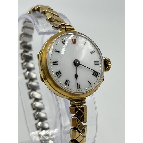 1157 - An early 20th century George Stockwell 9ct gold cased women's trench watch with Swiss Federal Cross ... 