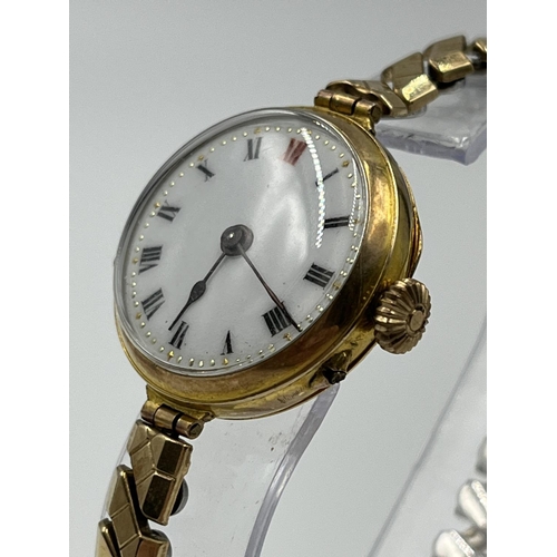 1157 - An early 20th century George Stockwell 9ct gold cased women's trench watch with Swiss Federal Cross ... 