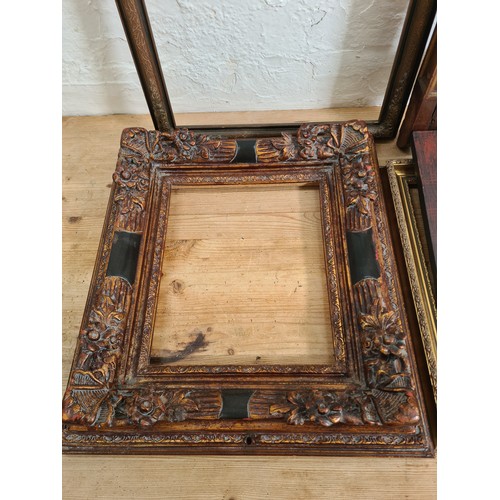 490 - Six items, four various gilt frames - largest approx. 92cm x 58cm and two modern hardwood framed wal... 