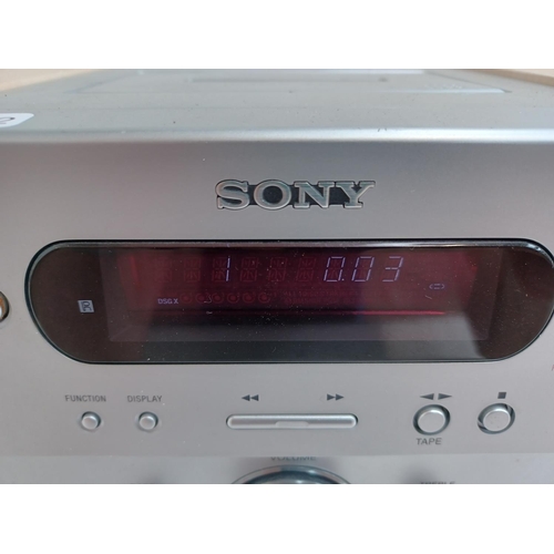 559 - A Sony HCD-GPX5 micro hi-fi system comprising cassette deck, radio and CD player with a pair of matc... 