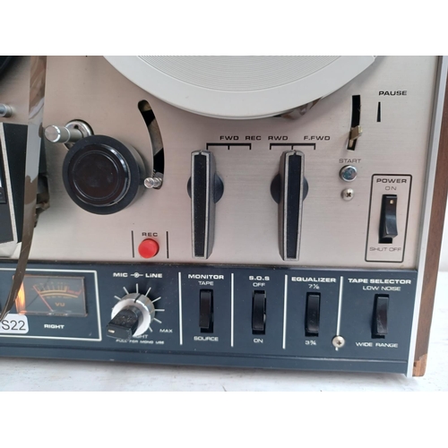 560 - An Akai 4000DS three head reel-to-reel tape recorder