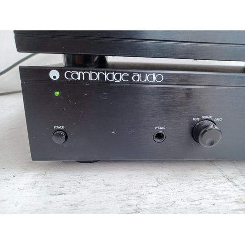 571 - Two items of Cambridge Audio hi-fi, one T100 double superheterodyne tuner and one A1 integrated ampl... 