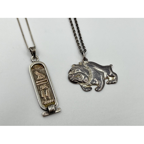 1061 - Two .925 silver pendant necklaces comprising Ancient Egyptian style hieroglyphs and British bulldog ... 