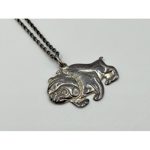 1061 - Two .925 silver pendant necklaces comprising Ancient Egyptian style hieroglyphs and British bulldog ... 