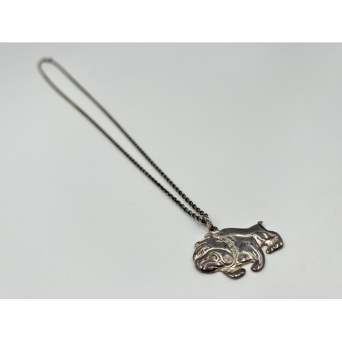 1061 - Two .925 silver pendant necklaces comprising Ancient Egyptian style hieroglyphs and British bulldog ... 