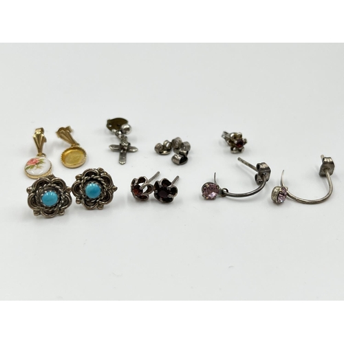 1070 - A collection of silver and white metal jewellery to include hallmarked Birmingham silver miniature i... 