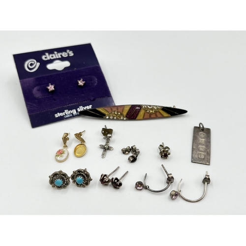 1070 - A collection of silver and white metal jewellery to include hallmarked Birmingham silver miniature i... 