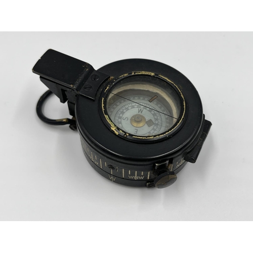 1106A - A WWII T.G. Co Ltd London MK III compass, dated 1940