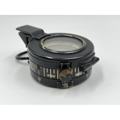 1106A - A WWII T.G. Co Ltd London MK III compass, dated 1940