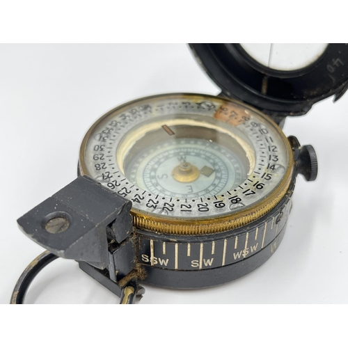 1106A - A WWII T.G. Co Ltd London MK III compass, dated 1940