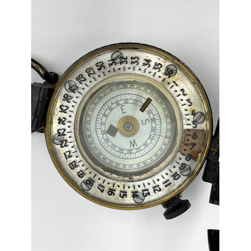 1106A - A WWII T.G. Co Ltd London MK III compass, dated 1940