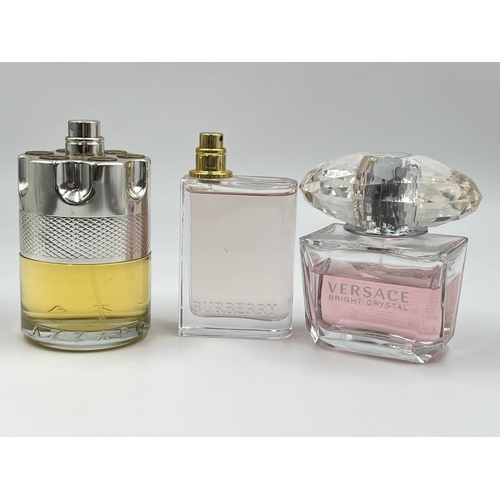 1163 - Three various fragrances, one Versace Bright Crystal 90ml eau de toilette, one Azzaro Wanted 100ml e... 