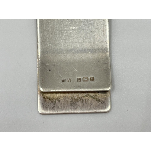 1167 - A hallmarked Birmingham silver money clip, dated 1983 - approx. gross weight 14.13 grams