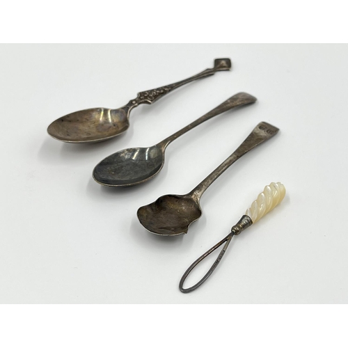 1201 - Four pieces of hallmarked silver and white metal comprising George V Sheffield silver tea spoon date... 