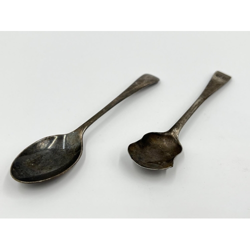 1201 - Four pieces of hallmarked silver and white metal comprising George V Sheffield silver tea spoon date... 