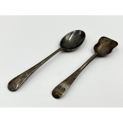 1201 - Four pieces of hallmarked silver and white metal comprising George V Sheffield silver tea spoon date... 