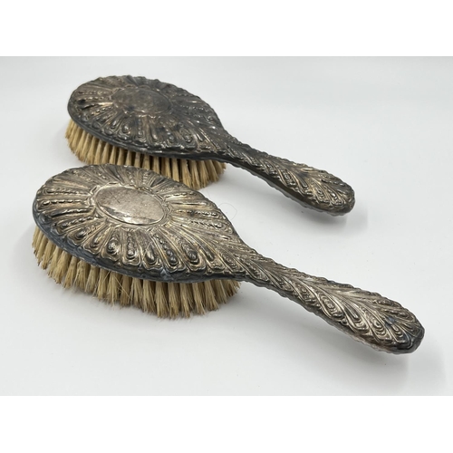 1204 - A pair of William Graeme hallmarked London silver hairbrushes, dated 1891 - approx. gross weight 320... 