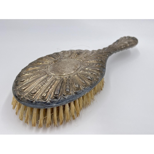 1204 - A pair of William Graeme hallmarked London silver hairbrushes, dated 1891 - approx. gross weight 320... 