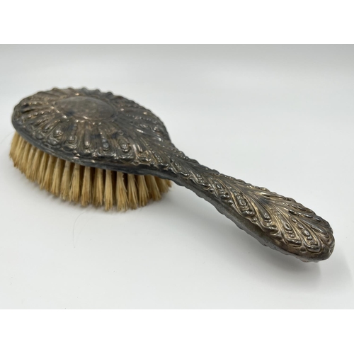 1204 - A pair of William Graeme hallmarked London silver hairbrushes, dated 1891 - approx. gross weight 320... 