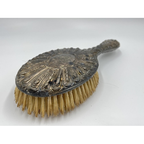 1204 - A pair of William Graeme hallmarked London silver hairbrushes, dated 1891 - approx. gross weight 320... 