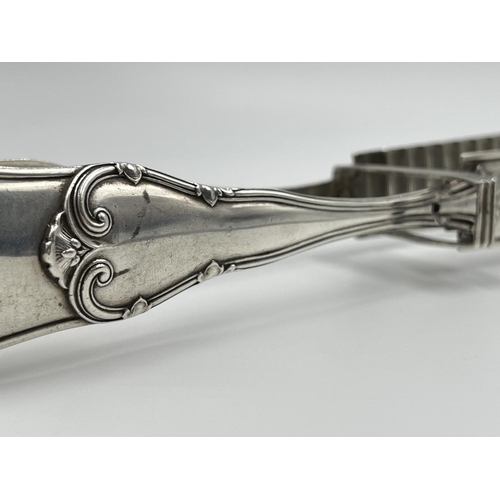 1207 - A pair of 19th century French grade one silver asparagus tongs - approx. gross weight 202 grams and ... 