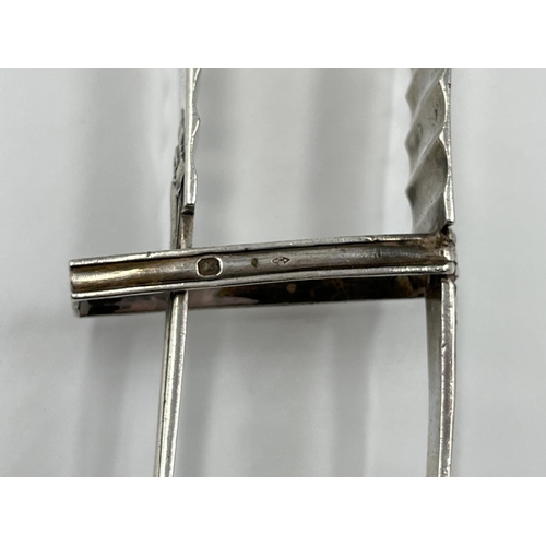 1207 - A pair of 19th century French grade one silver asparagus tongs - approx. gross weight 202 grams and ... 