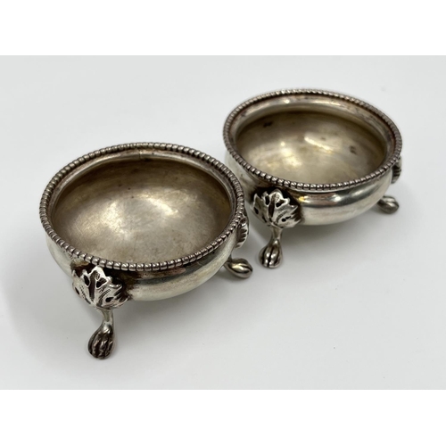 1209 - A pair of Victorian hallmarked Sheffield silver tri-footed salts, dated 1880 - approx. gross weight ... 