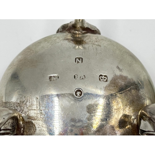 1209 - A pair of Victorian hallmarked Sheffield silver tri-footed salts, dated 1880 - approx. gross weight ... 