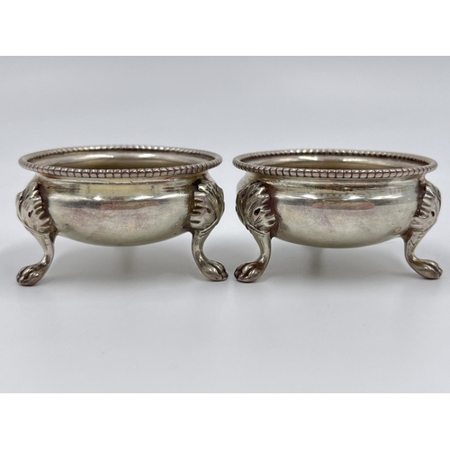 1210 - A pair of Victorian hallmarked Sheffield silver tri-footed salts, dated 1880 - approx. gross weight ... 