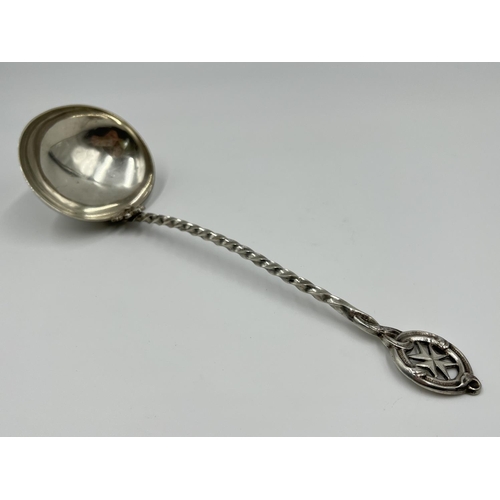 1211 - An antique Maltese .875 grade silver ladle - approx. gross weight 64 grams and approx. 21cm long x 6... 